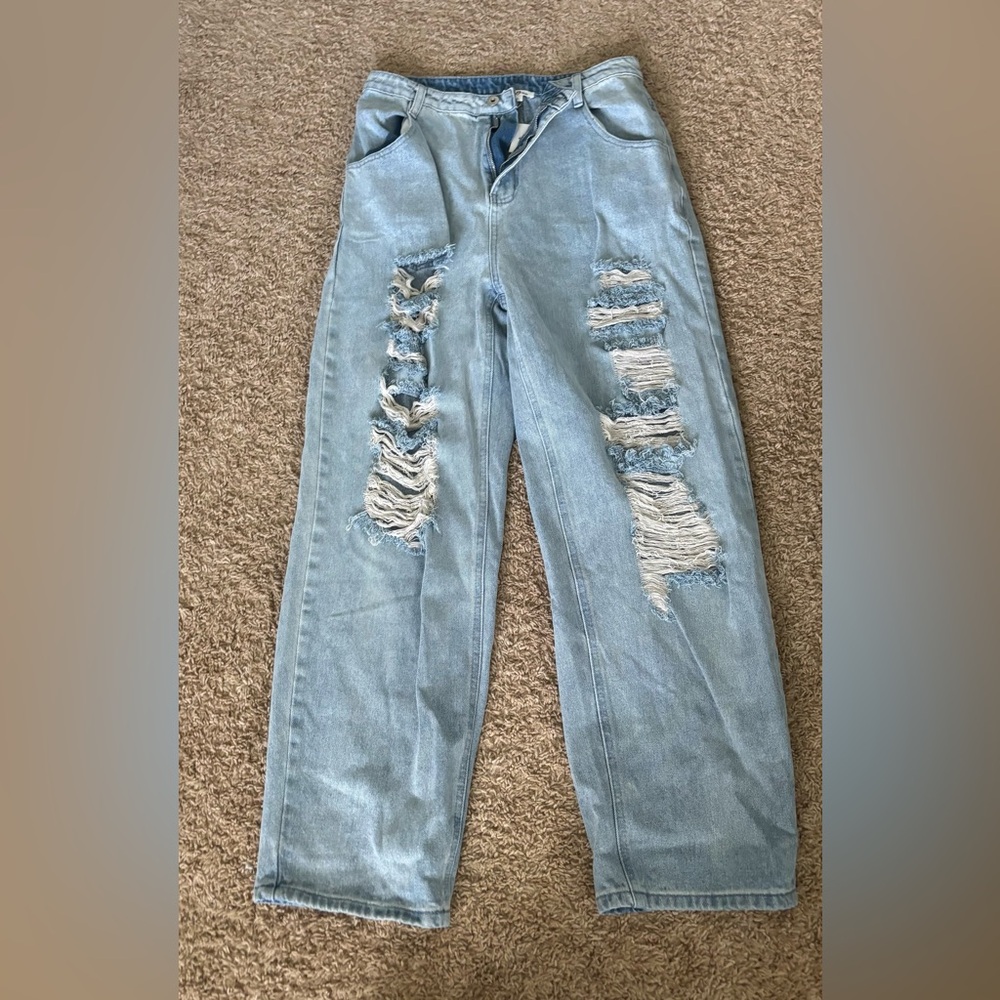 Distressed Light Blue Jeans